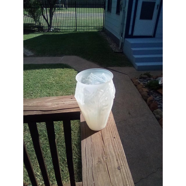 This vase is part of my personal collection, and I have enjoyed it for over 50 years. The detail and color are spectacular.