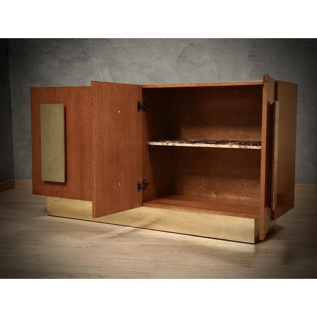 A one-of-a-kind sideboard for its originality and choice of materials. Simple but refined design, note the veneering and...