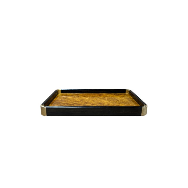 This elegant rectangular valet tray showcases a sophisticated marriage of natural textures and Art Deco-inspired design....