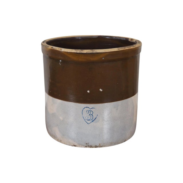 "Lot of three assorted salt glazed crocks. One brown and white 3 gallon crock by Burley & Winter, one brown and white 1...