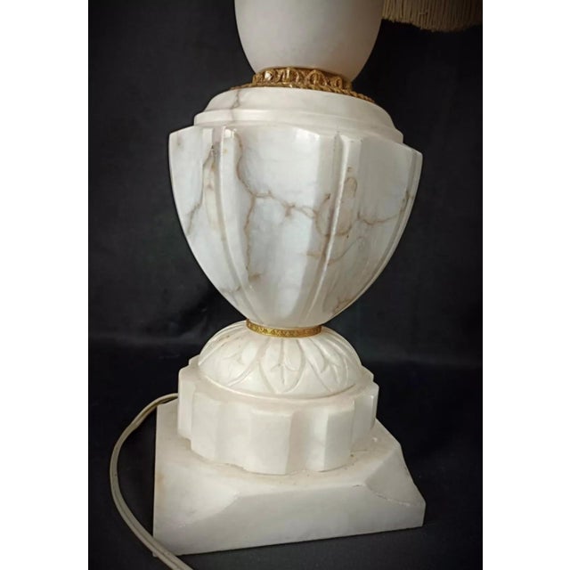 Condition: Good Comments: The lamp is in working condition, though the electrical wiring does not meet modern standards....