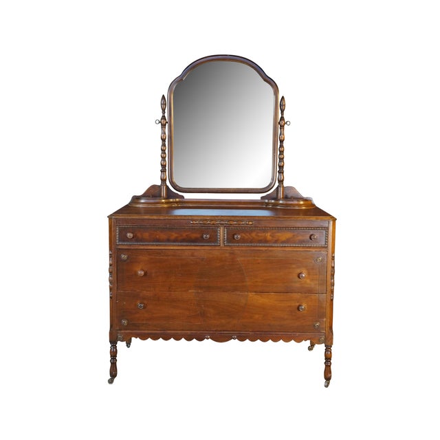 This antique 1930s Victorian Revival Knox-Hutchins dresser is crafted from beautiful walnut in, showcasing a rich, warm...