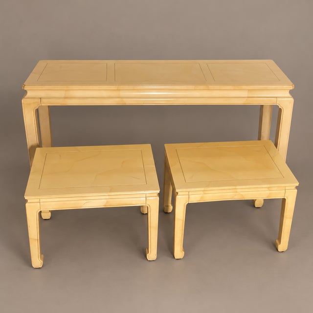 Offered is a goatskin lacquered wood console table and a pair of stools by Henredon. Benches have Ming style legs with...
