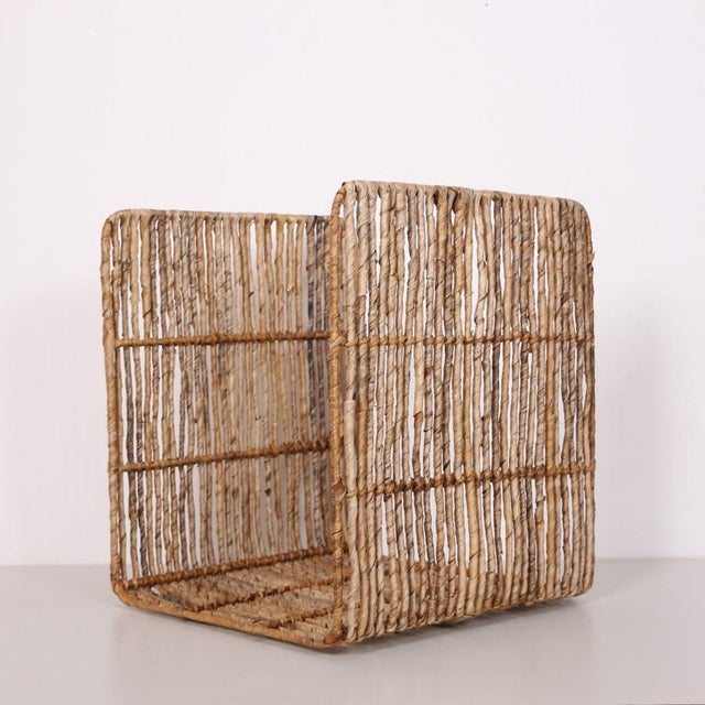 Our baskets, woven from the leaves of the natural Abaca plant, are meticulously handcrafted over a statically painted iron...