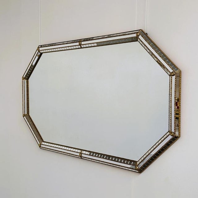 Width: 148 cm (58.3") Height: 85 cm (33.5") Depth: 5 cm (2") An impressive large Spanish wall mirror dating from the...