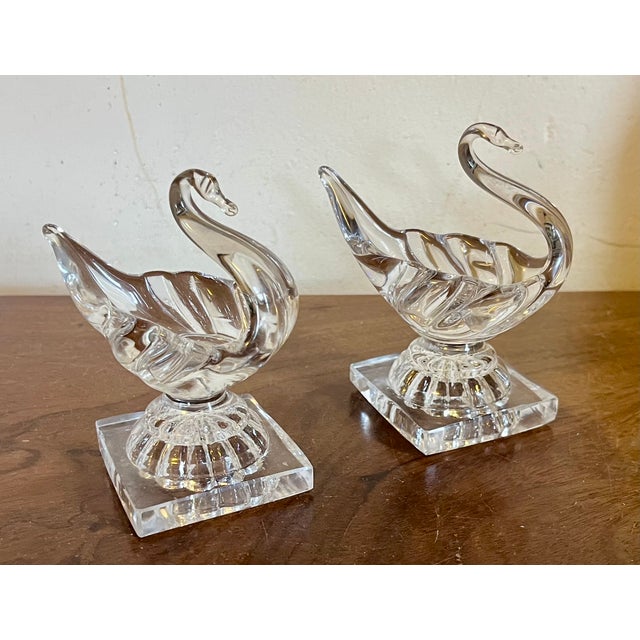Antique 19th century American flint glass swan form open salt cellars with lemon squeeze bases. Measure 3 1/2" x 3" x 4...
