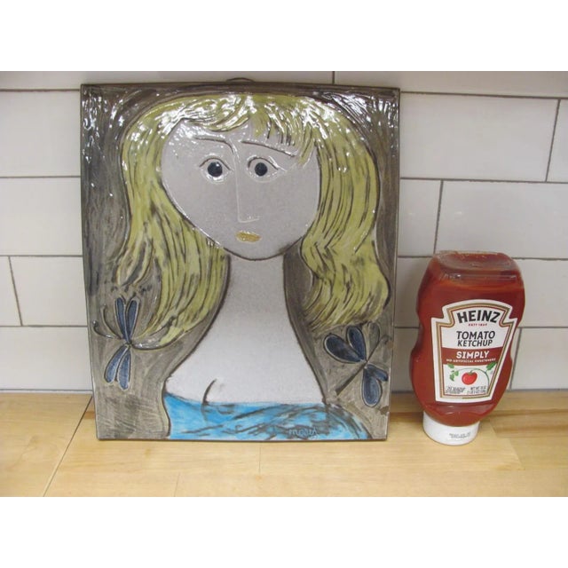 Great looking ceramic wall plaque by Mari Simmulson for Upsala-Ekerby of SWEDEN. It dates from the 1960s. Inscribed on the...