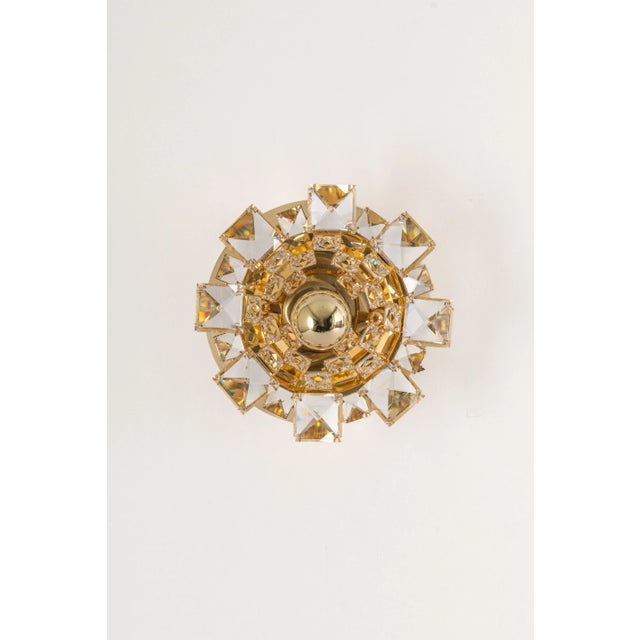 A pair of stunning golden sconces, made by palwa, germany, circa 1960-1969. crystal glasses on a gilt brass frame. High...