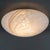 An elegant and rare designer ceiling light, ideal for enhancing living rooms, entryways, or professional offices with...