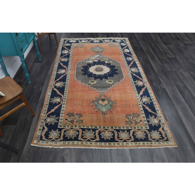 Vintage Hand-Knotted area rug is a semi-antique vintage area rug. The '70s Eastern region of Anatolia's unique rug is...