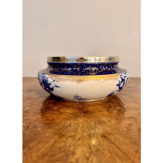 Fine quality large antique Doulton Burslem bowl, having a quality antique Doulton Burslem bowl, decorated with beautiful...