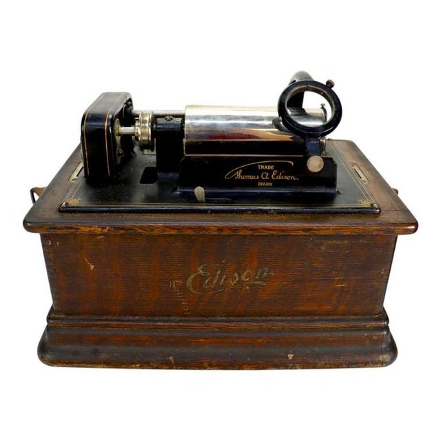 This antique Edison Standard Cylinder Player, Model D, is housed within a beautifully crafted oak case. The front of the...