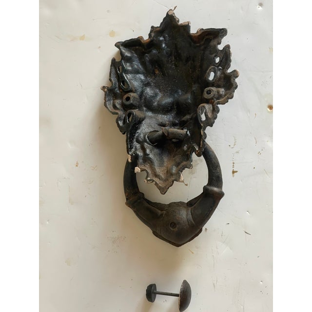 Gorgeous antique 19 th c iron door knocker in Rococo style.15”