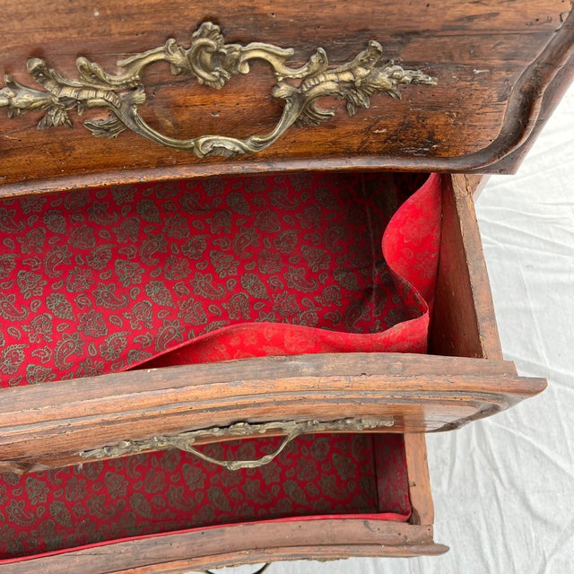 Late 18th Century French commode purchased from a European antique dealer. Features Victorian, floral-themed hardware and...