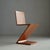 A single vintage 1990s Cassina “Zig-Zag” chair in cherry wood, marked underneath and numbered. The chair comes from a...