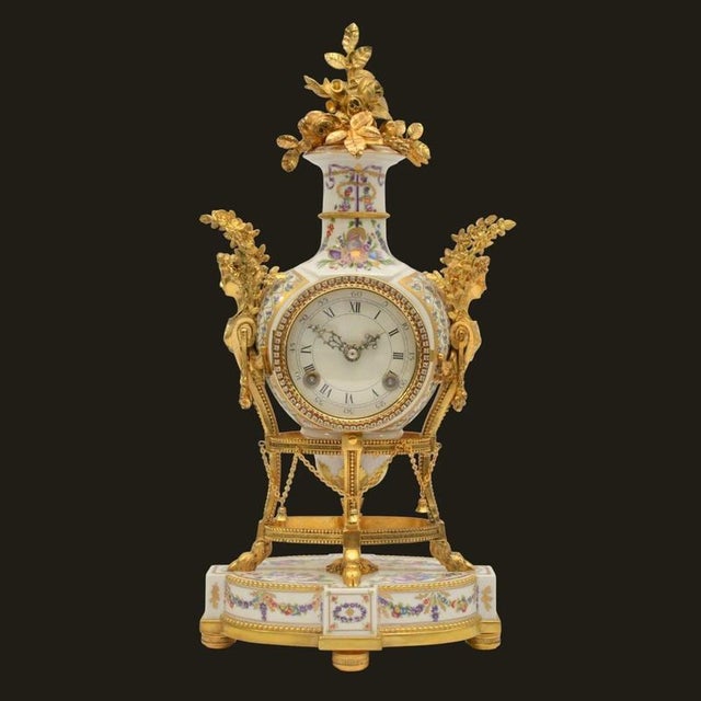 A highly decorative Victoria and Albert Museum licensed Marie Antoinette Flowers of Versailles”mantel clock, produced by...
