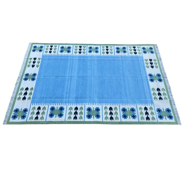 Cotton Sky Blue, Green And Black Leaf Pattern Reversible Rug - 9'x12'. These special flat-weave dhurries are hand-woven...
