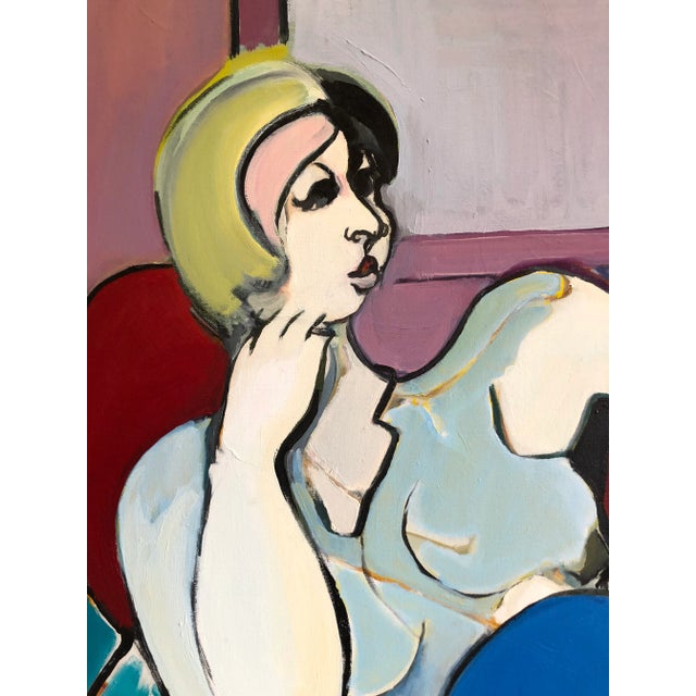 An original oil painting of a woman with blonde hair in blue jeans by artist Fay Singer from Malibu, CA. The piece was...