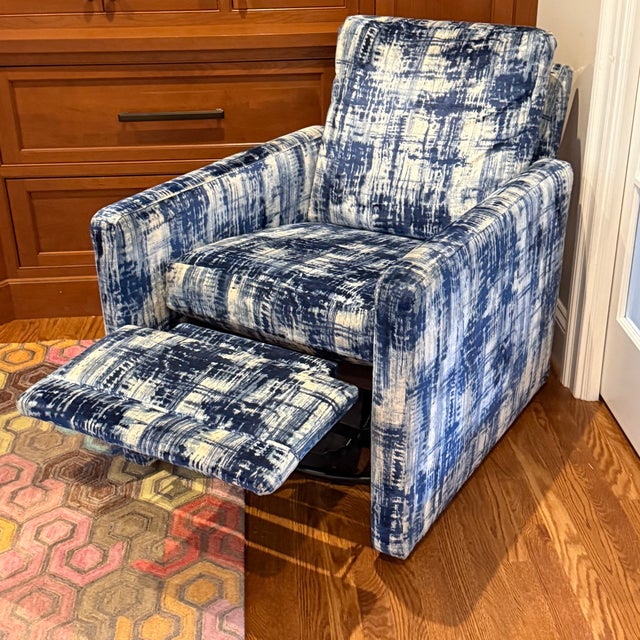 Lee Swivel Recliner Swivels, reclines, and makes a bold statement. 52” fully extended 28” x 33.5” x 33” h Seat 17.5 Arm 24