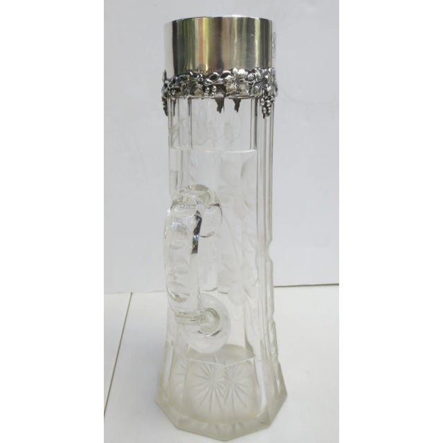 Dominick & Haff circa 1905 tall claret pitcher for the table. Antique 1905 sterling rim and deeply cut crystal paneled...