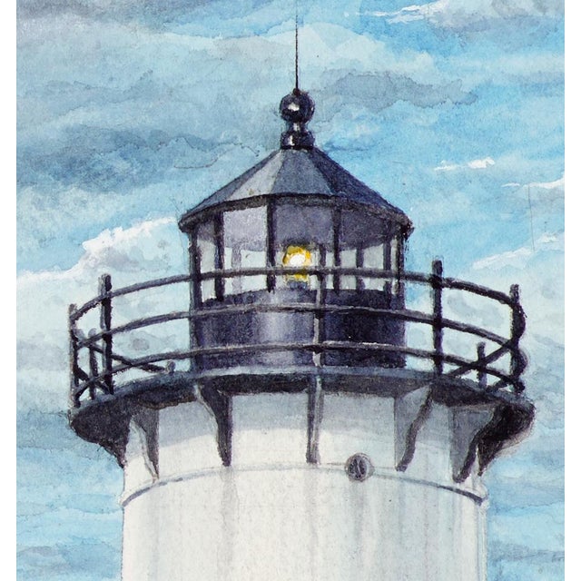 I was drawn to the iconic beauty of this lighthouse in Maine. I love the lighthouse keepers house and the clouds.