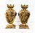 Elegant pair of 19th Century ormolu reticulated vases, crafted in the Louis XVI manner. The vases are cast from bronze and...