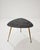 Vintage tripod coffee table dating back to the mid-century modernist period of the 1950s. It features a distinctive...