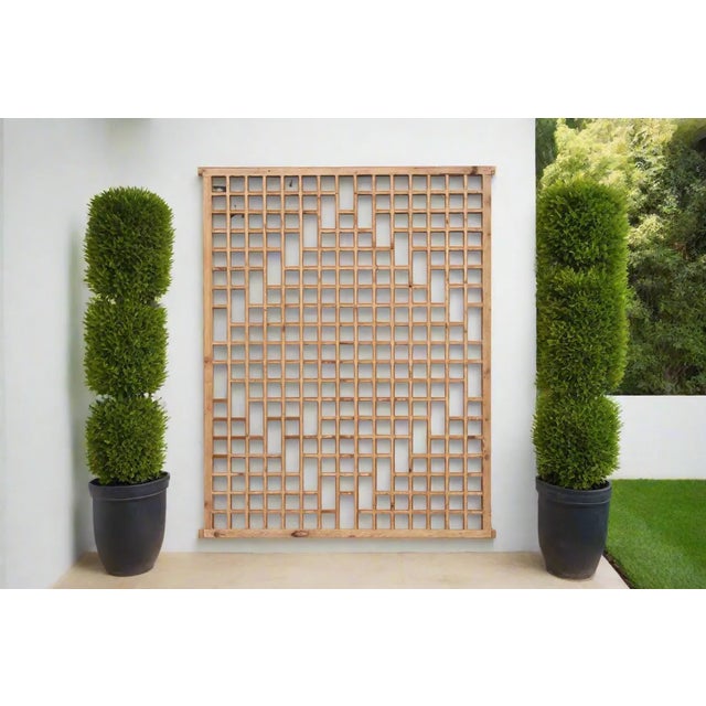 A lovely early 20th century architectural piece with all wooden lattice fretwork and a center geometric interweaving...