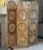 A vintage woven rattan folding screen featuring, arched panels and intricate handwoven sunburst motifs throughout. This...