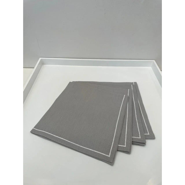 Set of four satin stitch napkins