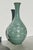 late 20th-century Korean Celadon vase. Classic flying crane pattern on a grey-green body color. Beautiful crackled celadon...