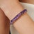 This elegant tennis bracelet is crafted in 925 sterling silver and beautifully set with 33 natural amethyst gemstones in a...
