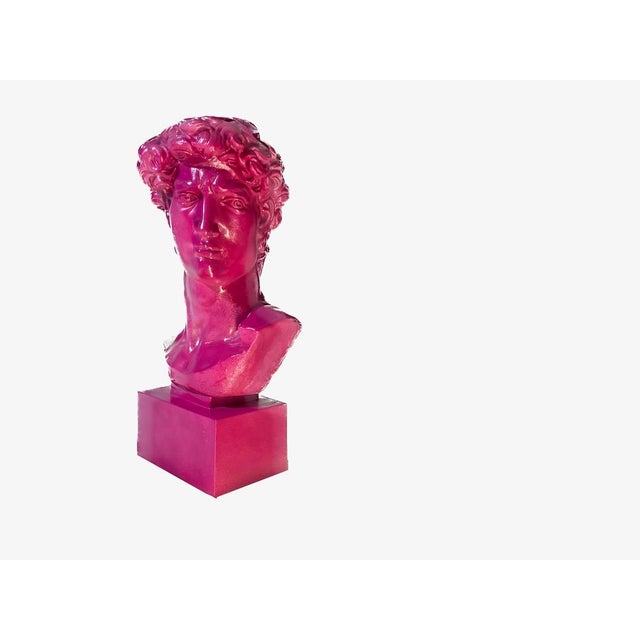This striking sculpture reimagines Michelangelo’s classical Renaissance masterpiece through a vibrant, contemporary Pop...