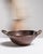 This 19th century serving piece from France is finished in terra cotta, worked in copper. Its form follows honest, well-...