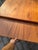 A masterpiece from one of Denmark's most important designers: This extendable teak dining table was designed by Grete Jalk...