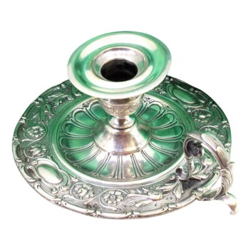 Circular Silver Paddle with Raised Floral Motifs, Grooved Engraving in the Center and Handle with Applications For Sale