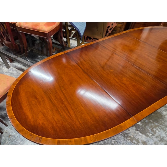 English Regency Revival Flame Mahogany Oval Extension Dining Table With Satinwood Crossbanding and Brass Paw Feet, Circa 1935 For Sale In Washington DC - Image 6 of 9