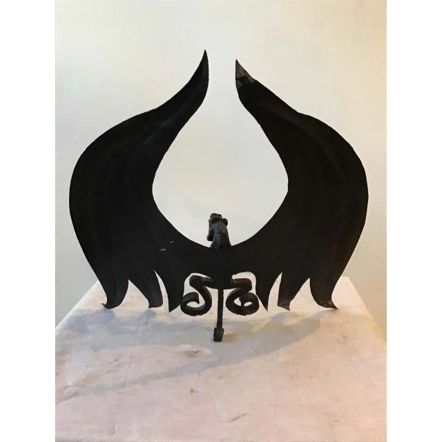 1920s handmade iron and tin dragon andirons.