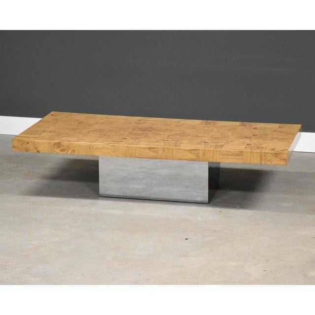 A mid century modern burl coffee table with a polished chrome base designed by Milo Baughman for Thayer Coggin. Excellent...