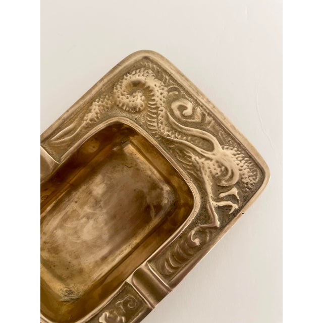 Vintage brass ashtray / catchall with dragon design. Great styling for your home and studio!