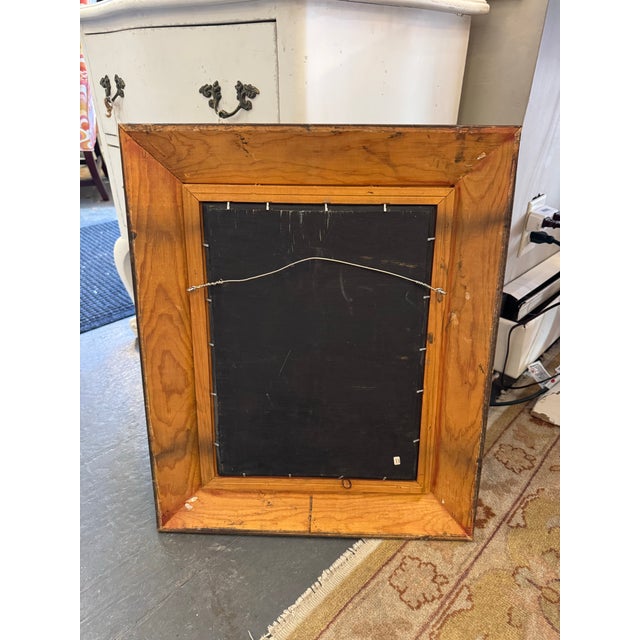 This is a framed portrait of a dog in a suit. It has the original framework and is signed by the artist, however the...