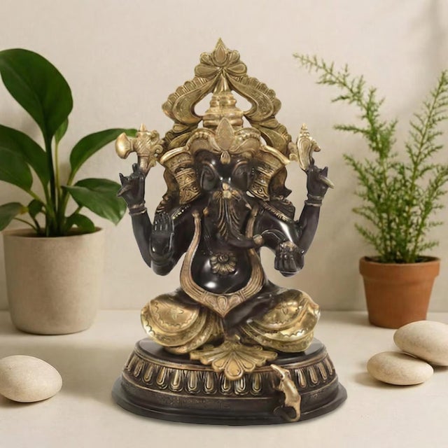 Invite the essence of wisdom and success into your home with this breathtaking 18 Inch Black and Gold Ganesha Brass...