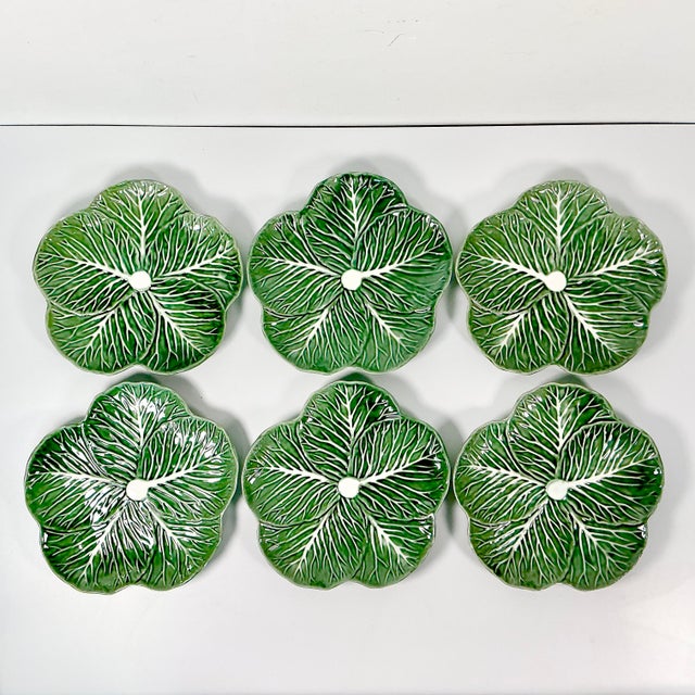 We love all Cabbage Ware dinnerware, but what we love most about this set of vintage dinner plates is the large leaf...