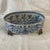 Stunning blue and white footed planter catchall bowl. Handcrafted of porcelain and brass. About Winward Home: Beauty can...