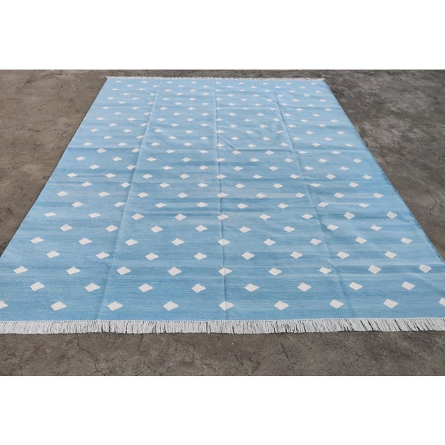 Cotton Vegetable Dyed Sky Blue And White Leaf Pattern Reversible Rug - 10'x14' These special flat-weave dhurries are hand-...