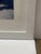 Soicher Marin Snowmass 1968. Print of Group of people at mountain, white frame. Original retail $2800. Showroom floor sample.