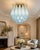 Pair ceiling lamps with 32 blue light blue Murano Glasses in golden painted metal frame. Elegant lighting object. Period:...
