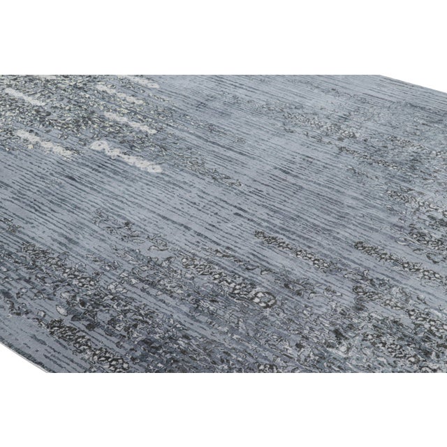 This hand-knotted wool 8x11 rug represents a bold new line of Rug & Kilim’s Modern Collection—a series of contemporary...