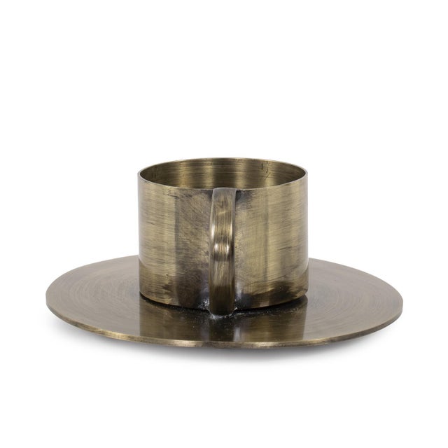 Illuminate your space with a touch of vintage-inspired elegance and modern flair using our Italo Candle Holder. This piece...