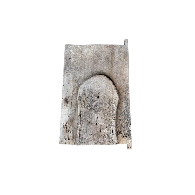 A rice granary door from the Batak Tribes people of Lake Toba, central Sumatra., Indonesia c. 1900. It features a...